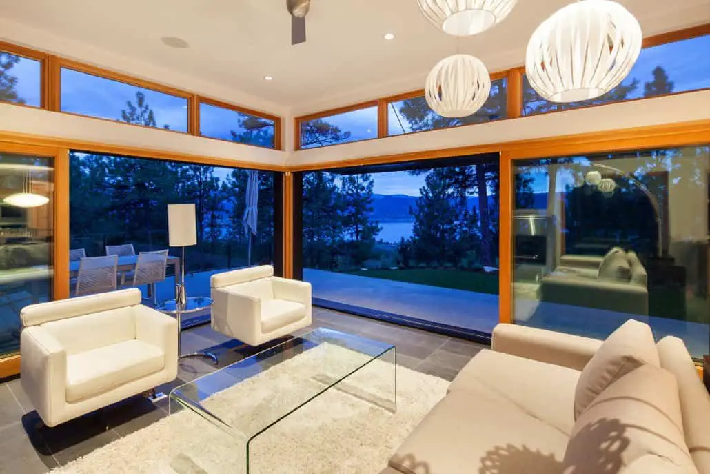 The Kitsilano prefab home - living room, large floor to ceiling windows.